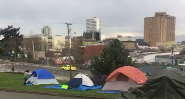 One Man in Custody Following Stabbing at Tent City