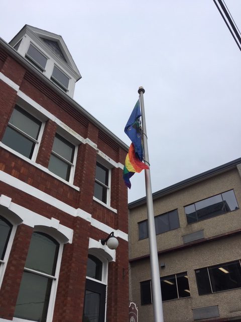 Pride flags flying in the Valley