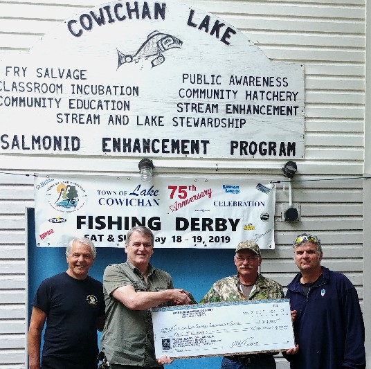 Fishing Derby organizers present cheque