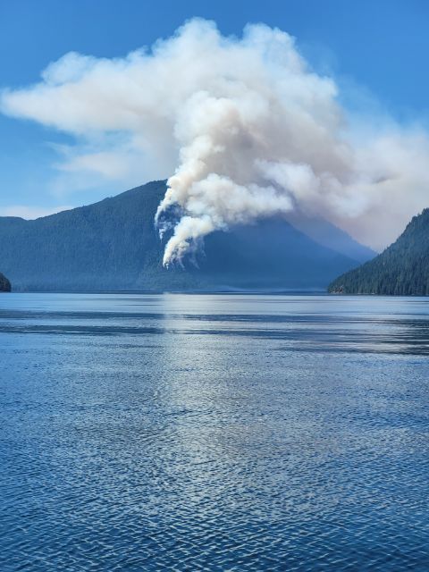 Island remains mostly safe from wildfires, but mainland smoke rolling in