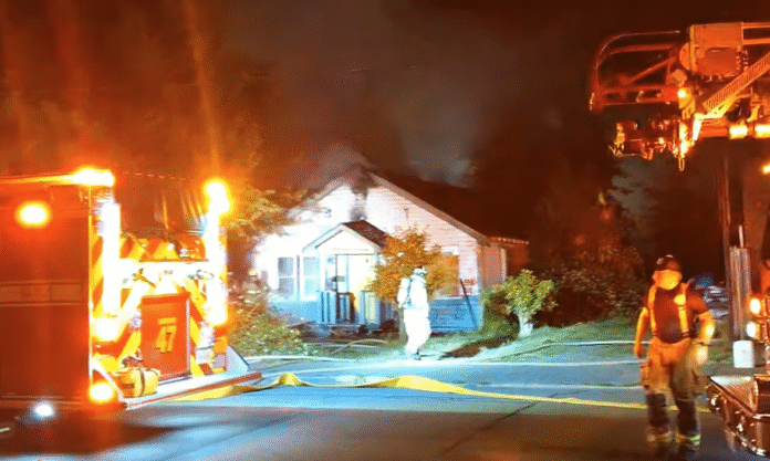Firefighters at the scene of a house fire in North Cowichan